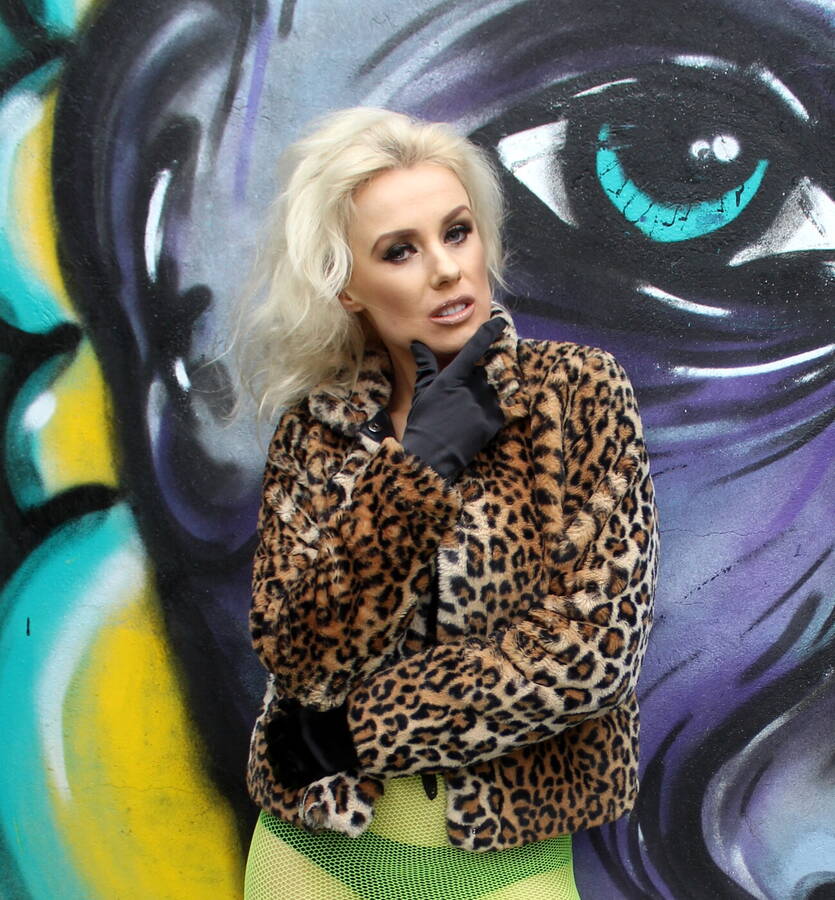 digital artist WiggliesDigitalServices alternativefashion modelling photo taken by @wigglybeezersforeverandeverarts . the beautiful gloria with green dress works well with graffiti.