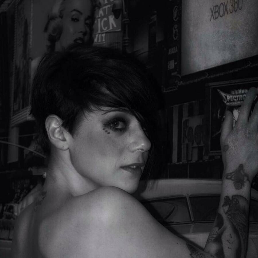model Harleyquinnn implied nude modelling photo taken at Studio