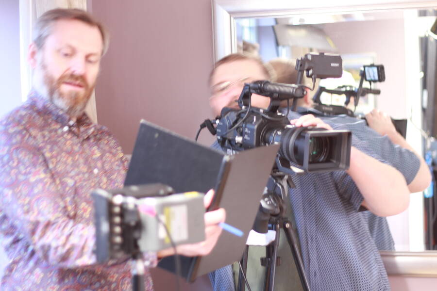 photographer Big Yellow Feet ltd filming on set modelling photo