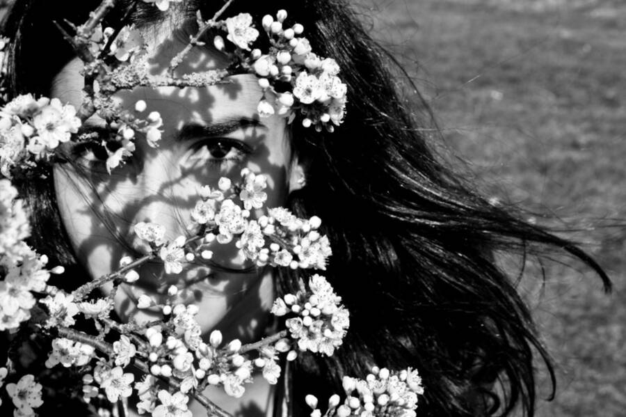 photographer natalieoneill editorial modelling photo taken at Hampshire. cherry blossom tree  model in bw.