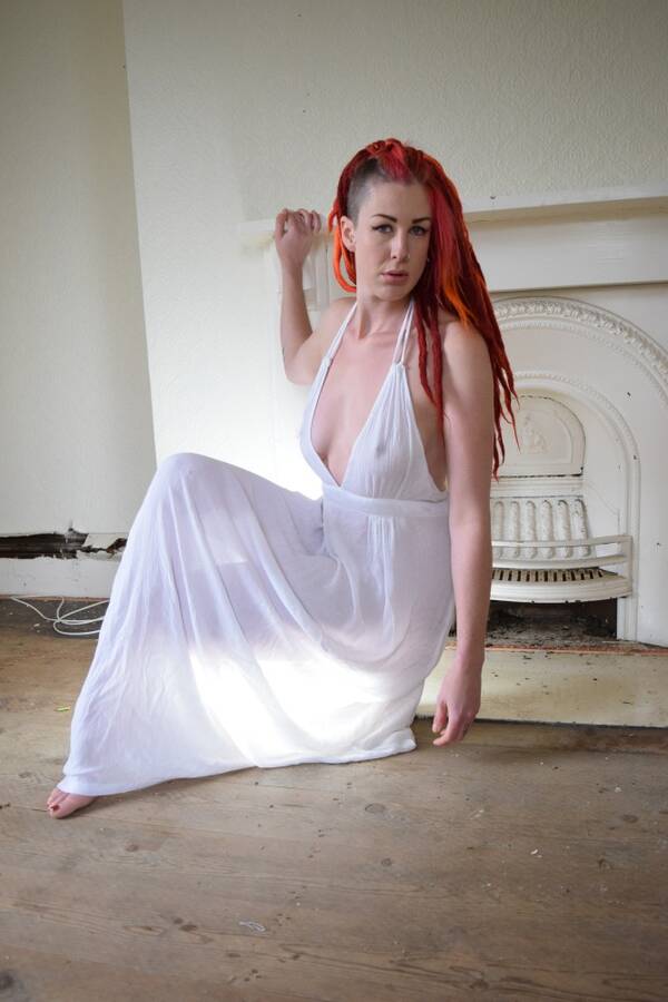 photographer Alan Tog implied nude modelling photo taken at Derby with  Neena. the white princess in a sheer white  back lit dress and autumnal red hair.