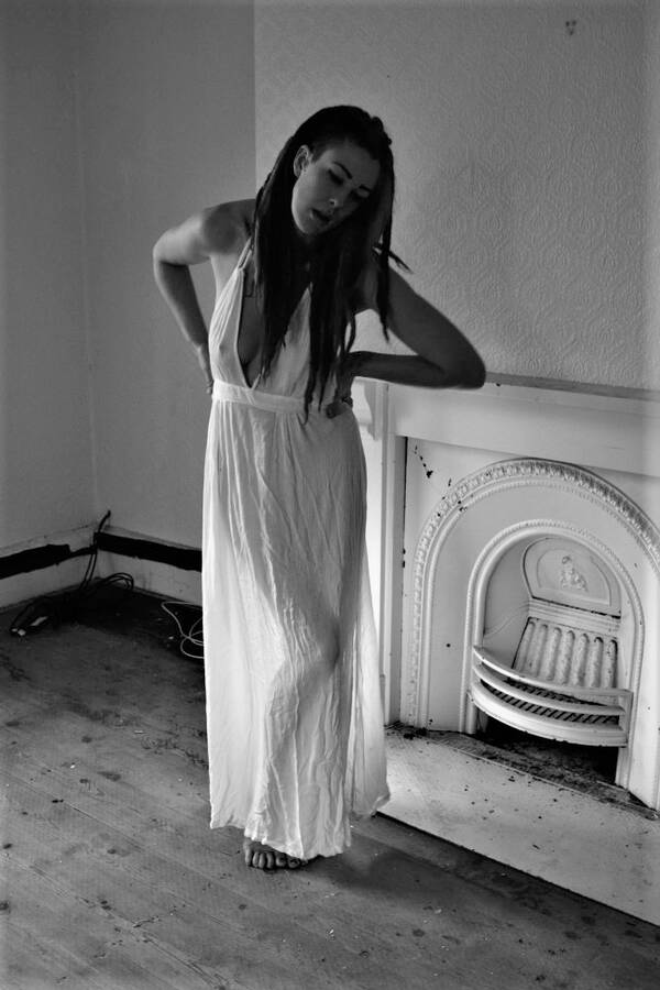 photographer Alan Tog lingerie modelling photo. back light used to illuminate this sheer dress black and white derelict farm house.