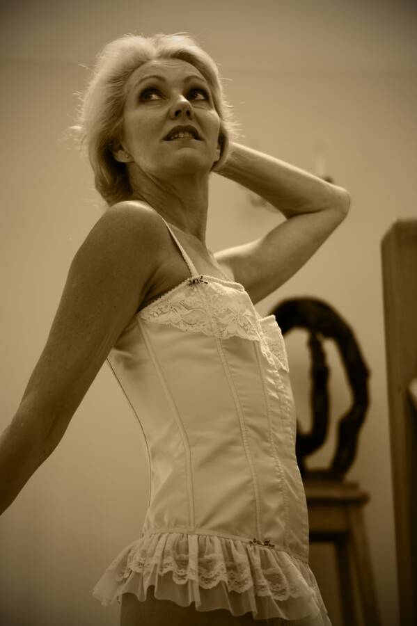 photographer Alan Tog lingerie modelling photo taken at At models home with @Juliette1961 . bw image of lovely juliette wearing a lovely corset.