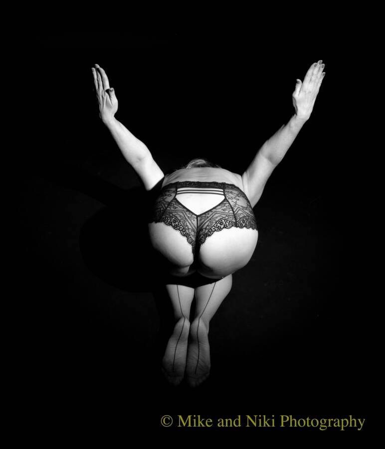 photographer Mike and Niki lingerie modelling photo. assume the position.
