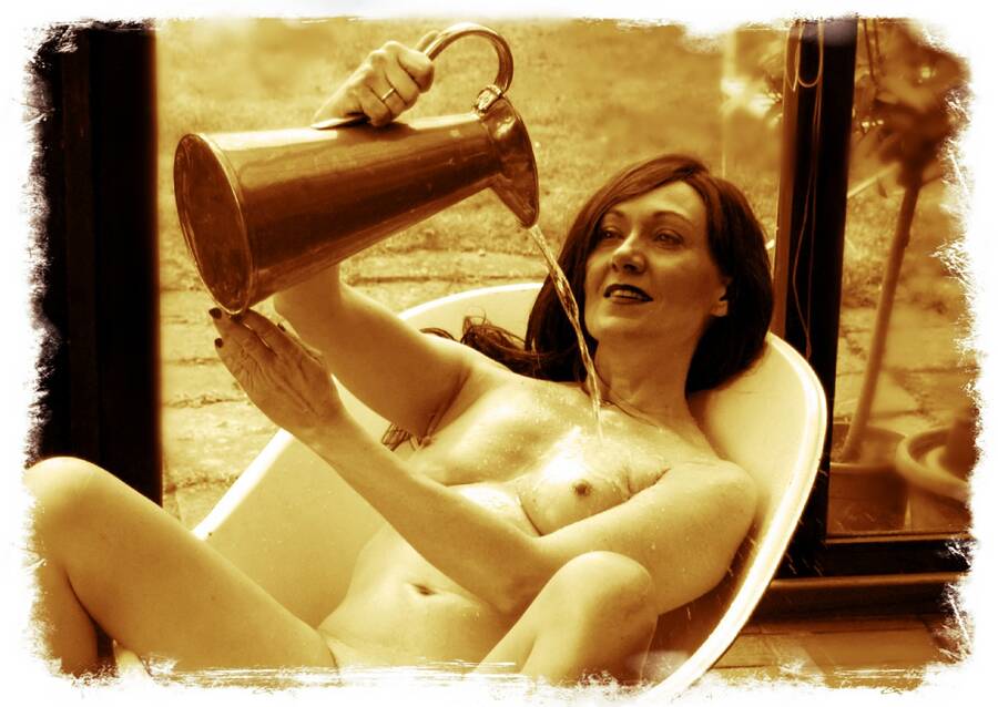 photographer Alan Tog nude modelling photo. lovely mature model posing in am antique french victorian hip bath just adding the water hope the window cleaner or the postie doesnt come.