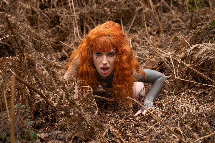 photographer nik implied nude modelling photo. flame haired huntress.