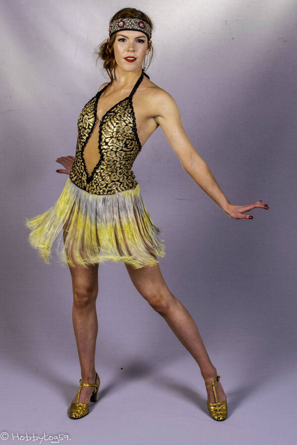 photographer Alan Tog theme modelling photo. new to modelling not to dance though styled in a 1920s flapper girl style dress including head dress.