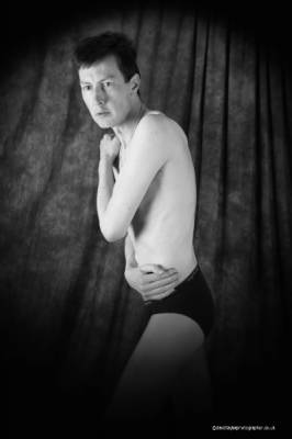 model RichardStandup lingerie modelling photo taken at Brislinghurst taken by @DavidTaylor . male topless in briefs clasping shoulders.
