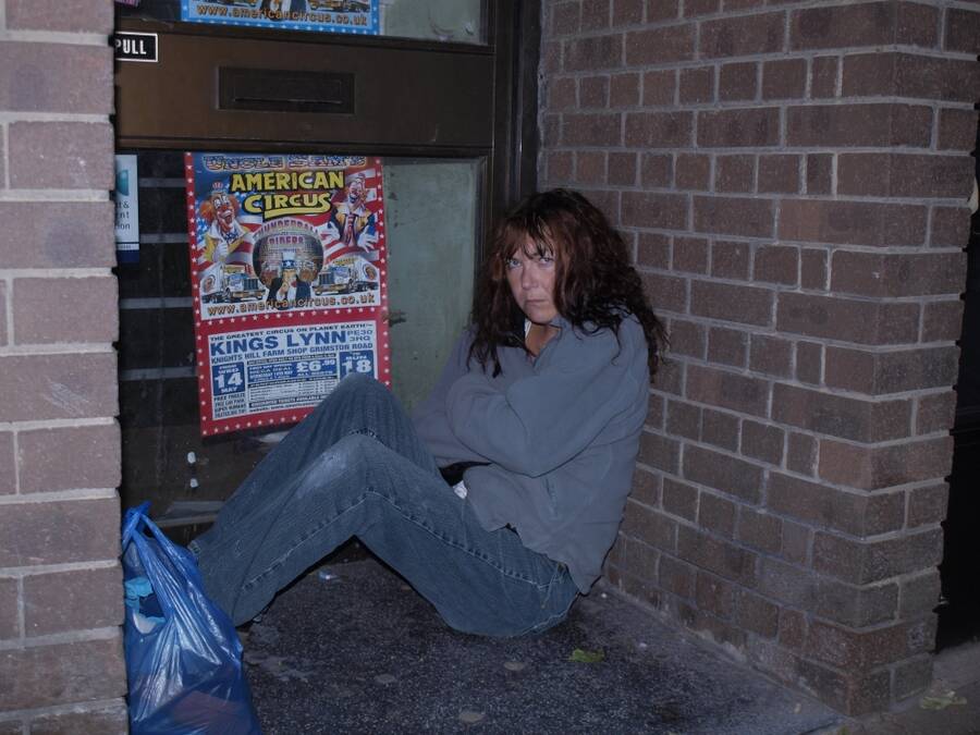 photographer Baron Michael theme modelling photo taken at King's Lynn with Suzie Wildfire. homeless woman in town center.